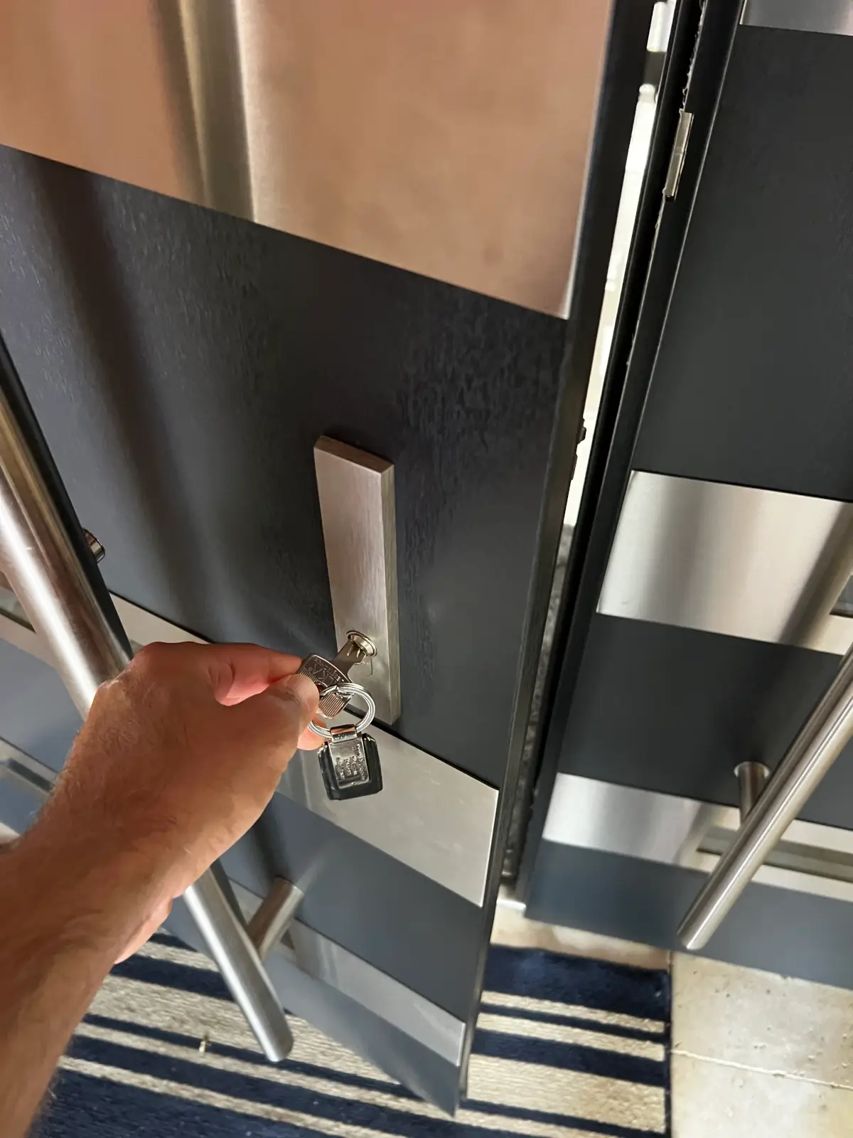 Locked Out of Business in Jonesboro AR: 5 Critical Steps 1 Locked out of business in Jonesboro AR locksmith unlocking commercial door